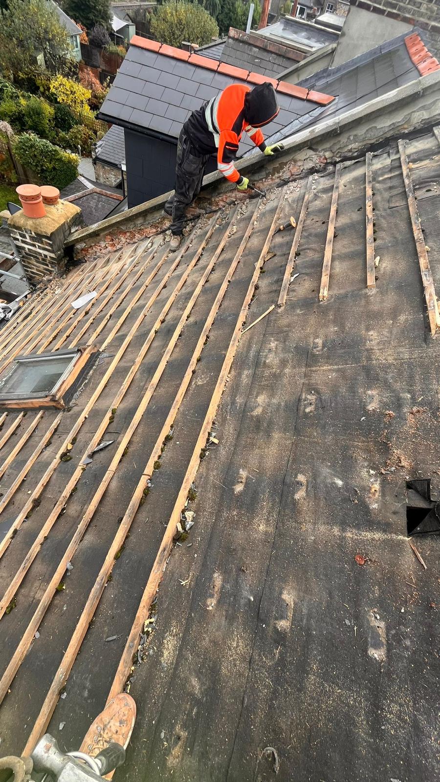 Full roof strip — battens and rubble removed ready for new felt