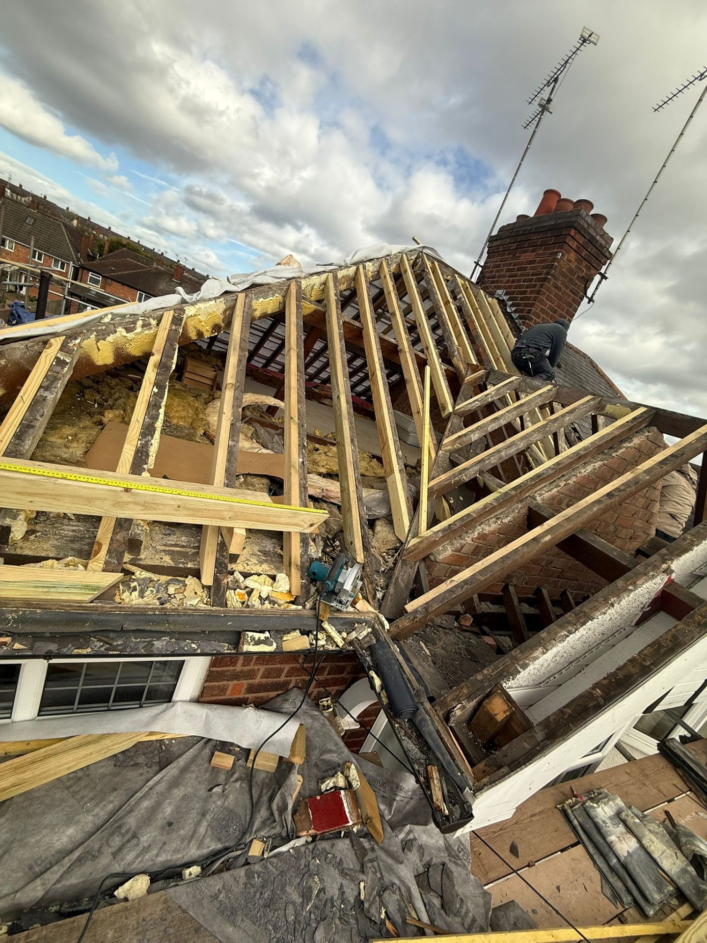 Full roof strip and new timber rafters during re-roof