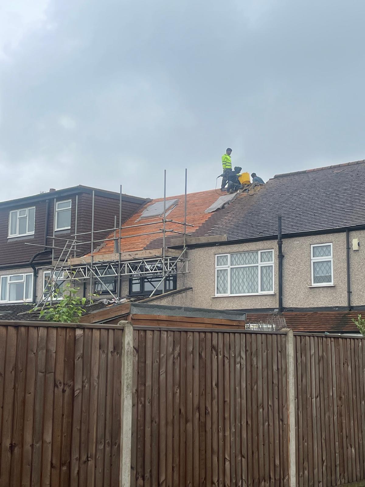 ABL Roofing team stripping tiles for a full re-roof