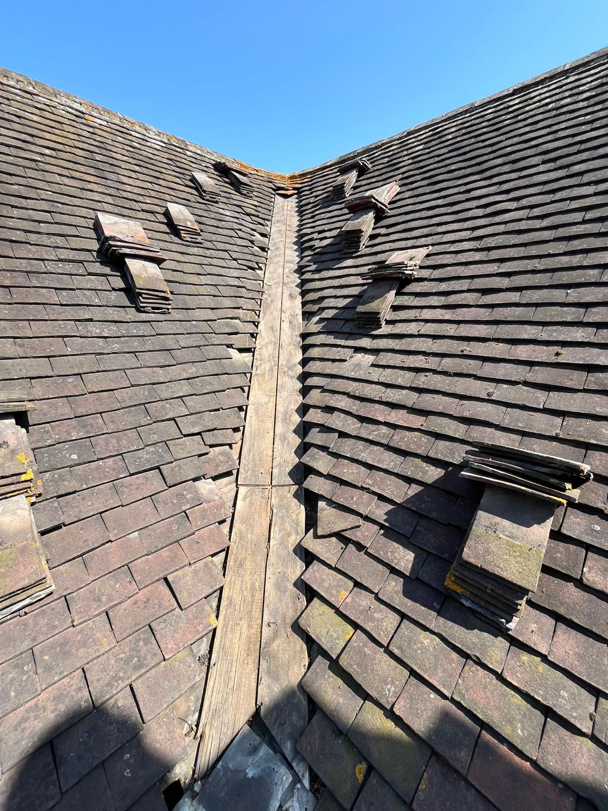 Lead valley detail with dressed slates on a period property