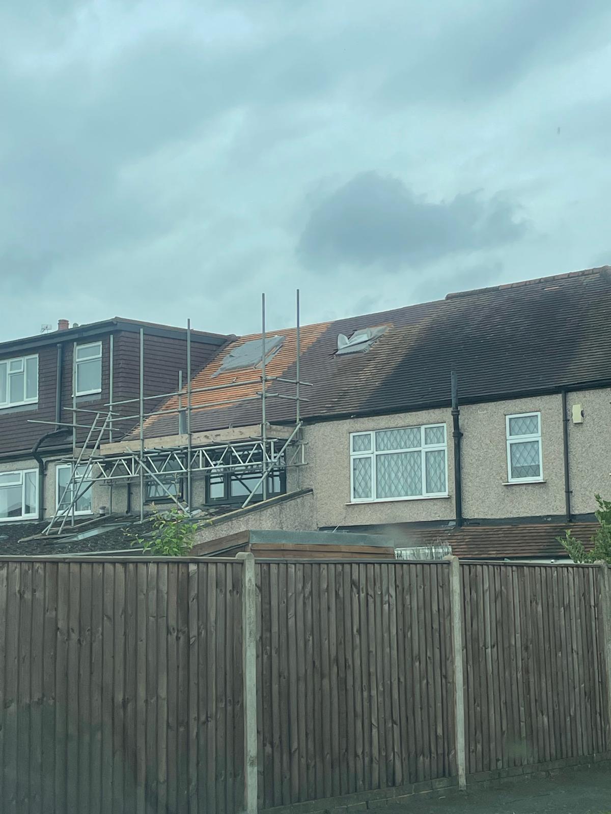 Re-tiling of a hipped garage roof in South London